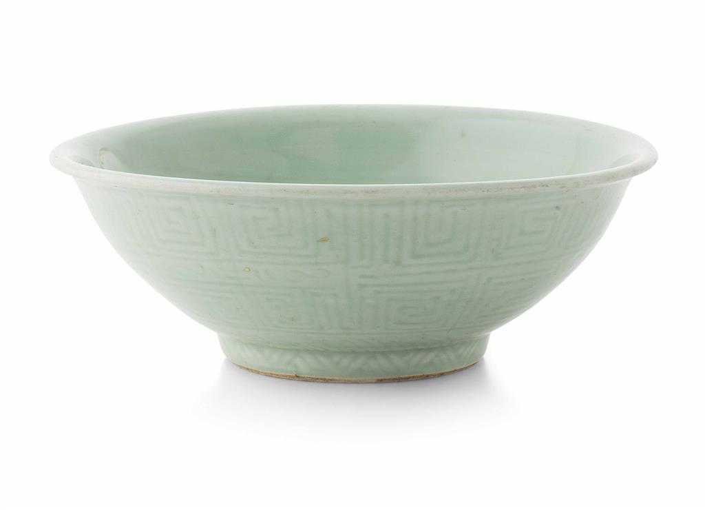 Appraisal: CELADON GLAZED AND CARVED BOWL LATE QING DYNASTY the exterior