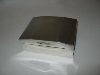 Appraisal: AN ART DECO CIGARETTE BOX of oblong form the domed