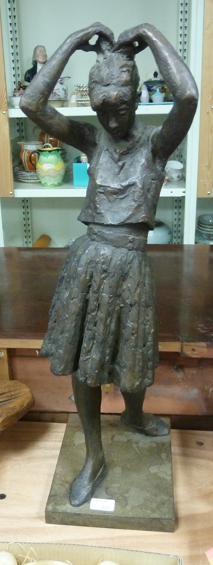 Appraisal: A rough cast figure of a ballerina monogrammed and dated