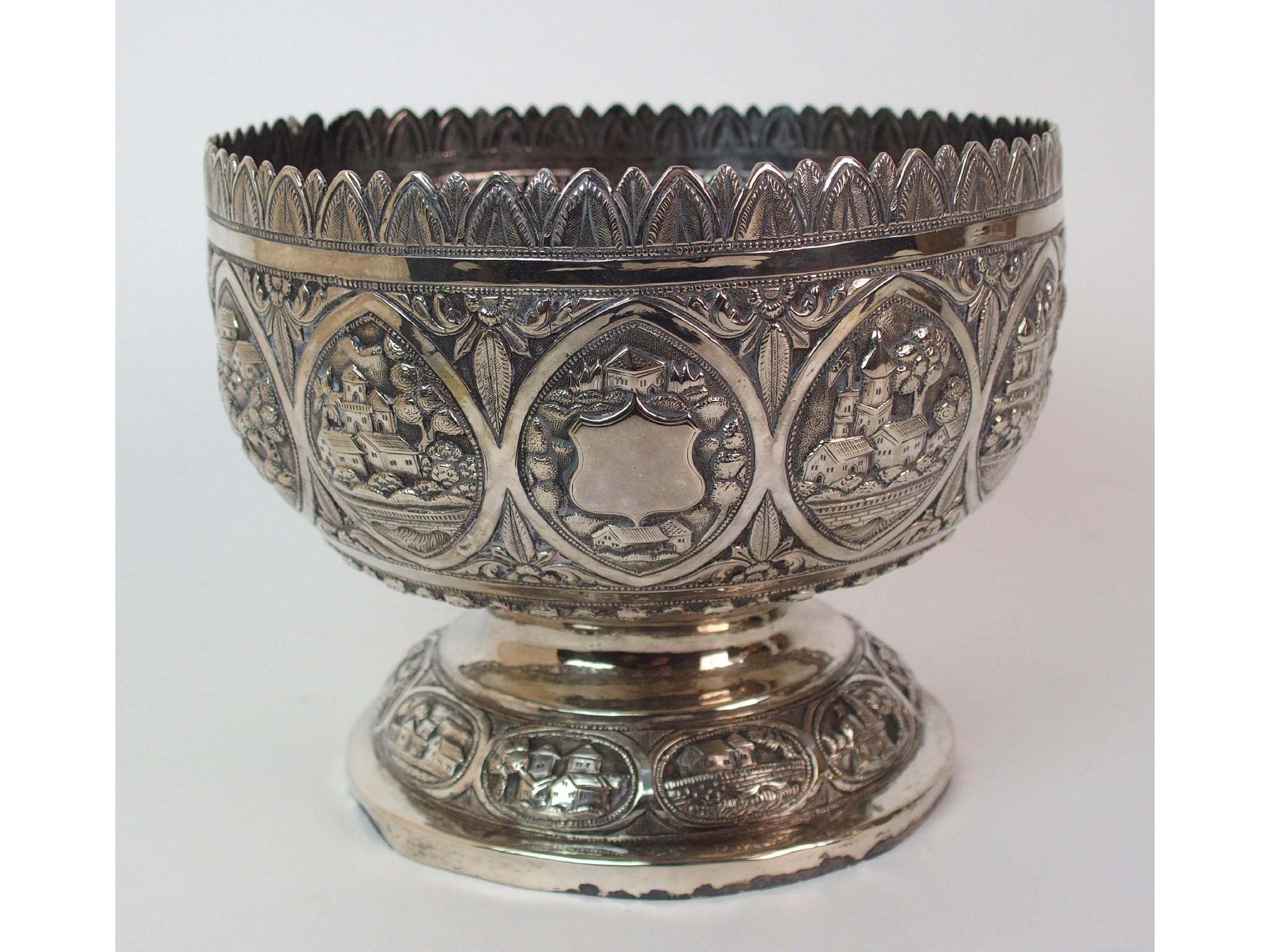 Appraisal: An Indian silver embossed and chased bowldecorated with oval panels