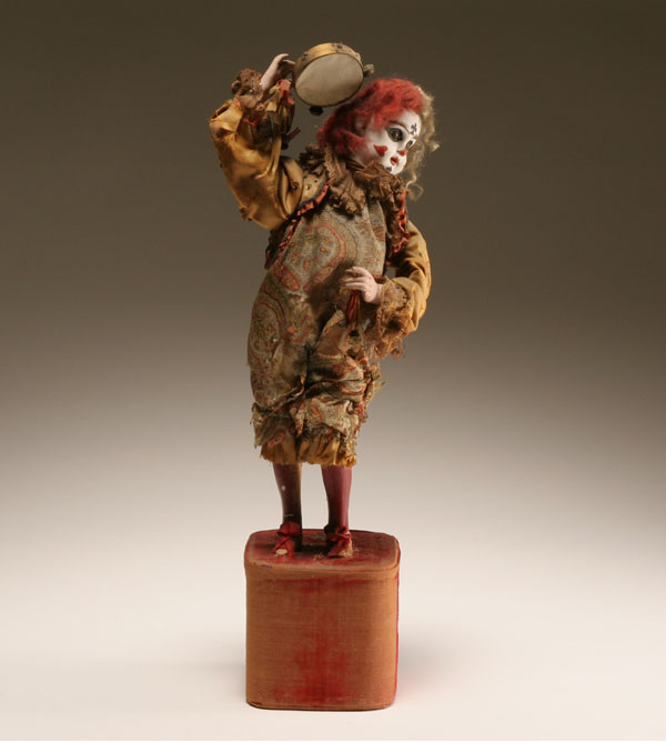 Appraisal: Lambert clown with tambourine French Jumeau bisque head automaton the