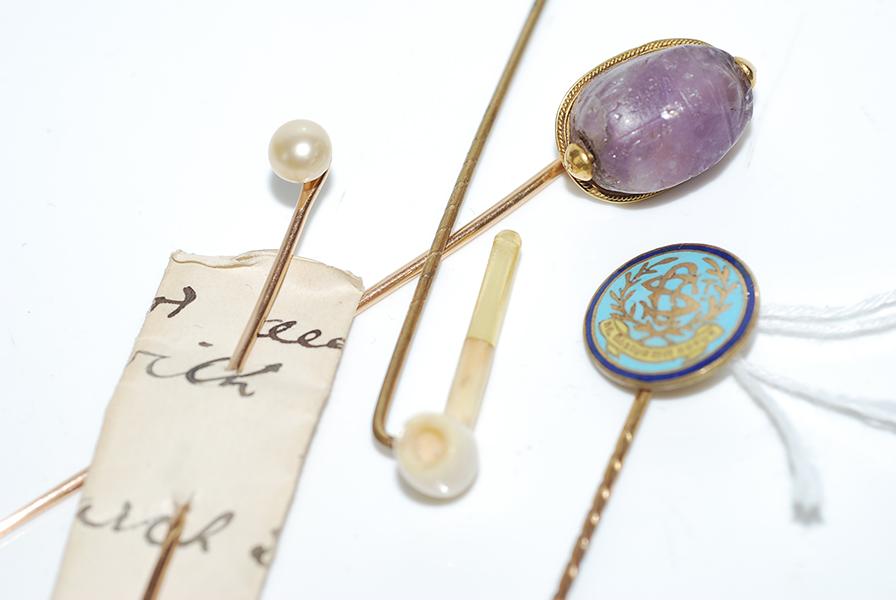 Appraisal: A COLLECTION OF STICK PINS INCLUDING AMETHYST SCARAB AND CULTURED