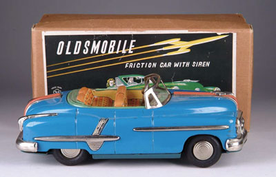 Appraisal: JAPANESE FRICTION OLDSMOBILE IN ORIGINAL BOX This colorful blue convertible