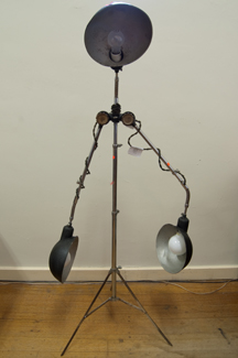 Appraisal: VINTAGE INDUSTRIAL THREE HEADED LAMP