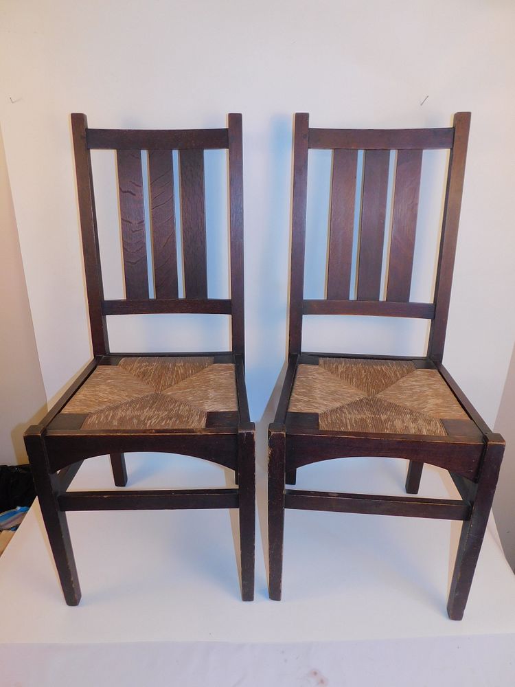 Appraisal: PAIR GUSTAV STICKLEY CHAIRS Pair Gustav Stickley dark oak pegged