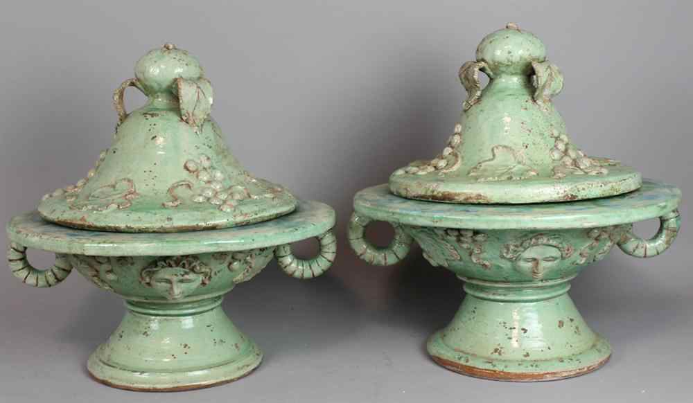 Appraisal: TWO FRENCH BLUE GREEN TERRA COTTA COVERED URNS both incised