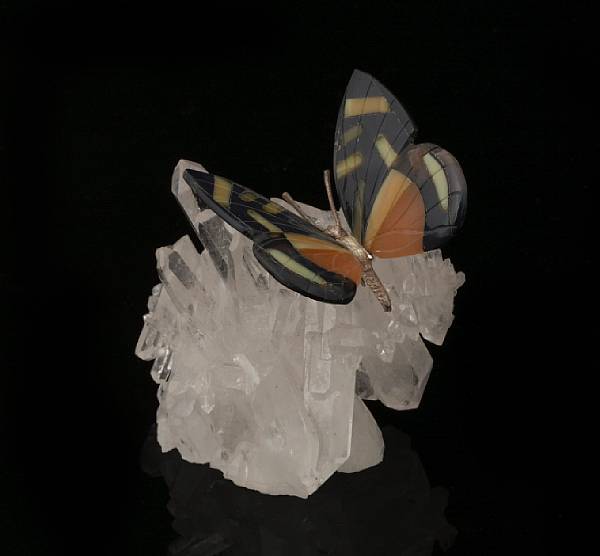 Appraisal: Lapidary carving of butterfly on quartz crystal base Together with