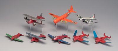 Appraisal: Eight toy airplanes six painted metal two with folding wings