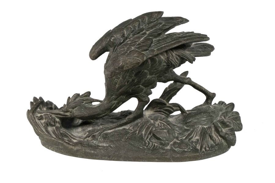 Appraisal: BRONZE BIRD SCULPTURE Figure of a Heron Catching a Frog