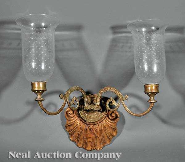 Appraisal: A Pair of Neoclassical-Style Gilt Bronze and Carved Walnut Two-Light