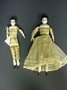 Appraisal: PAIR OF GERMAN CHINA HEAD DOLL Doll house on printed