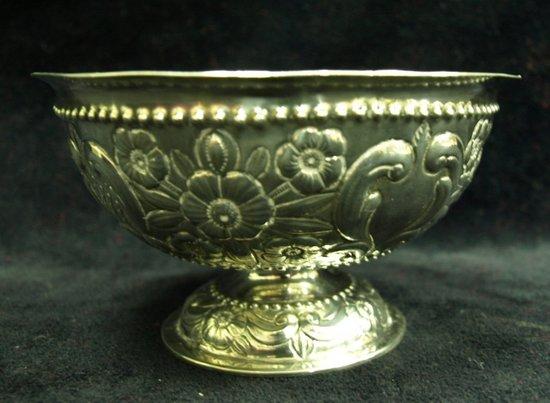 Appraisal: A Victorian pedestal bowl embossed flowers C scrolls etc cm