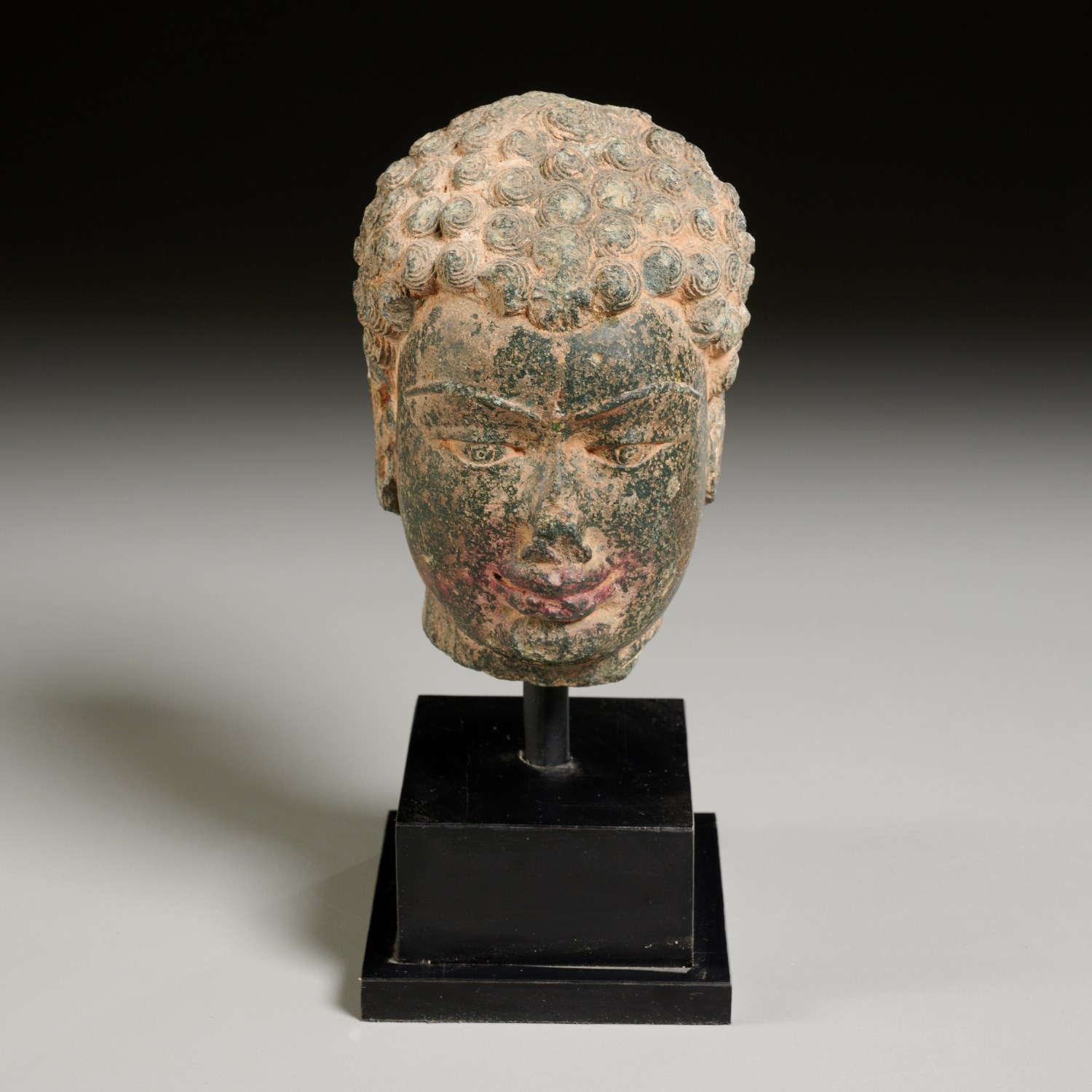 Appraisal: GANDHARAN STYLE CARVED STONE BUDDHA HEAD Possibly th c BCE