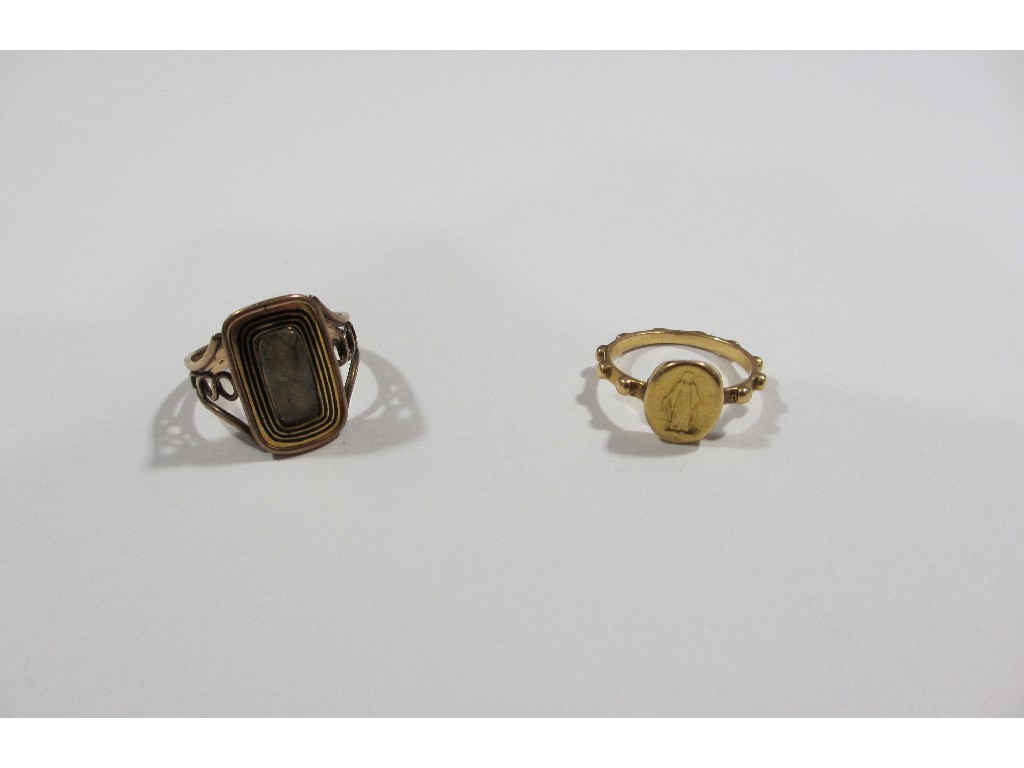 Appraisal: Lot comprising a Victorian yellow metal hair locket ring and