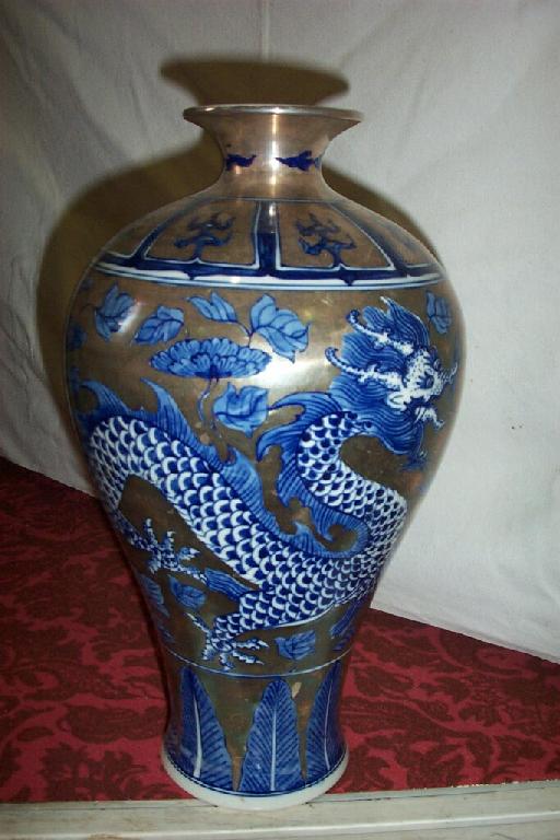 Appraisal: A heavy oriental vase of shouldered form with blue and