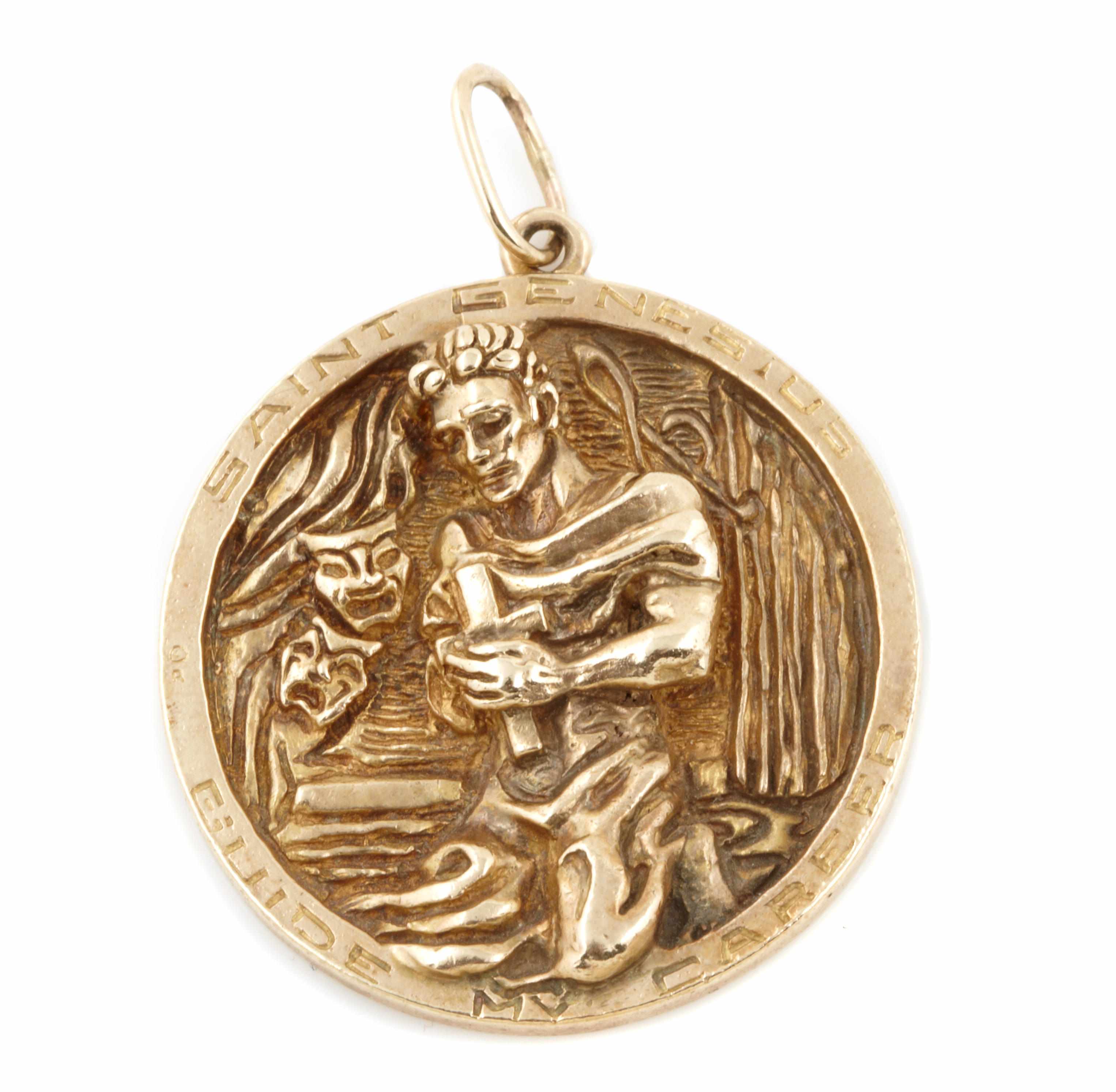 Appraisal: A k gold St Genesius pendant signed Ruser g