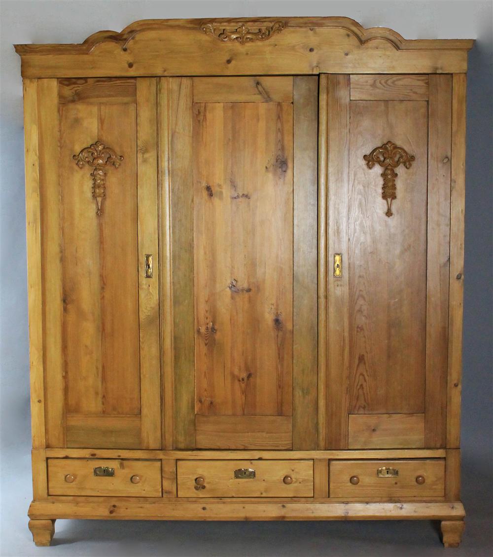 Appraisal: EDWARDIAN STYLE PINE THREE DOOR ARMOIR three paneled doors enclosing