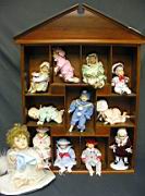 Appraisal: ASHTON DRAKE PICTURE PERFECT BABIES Mini dolls in a wood