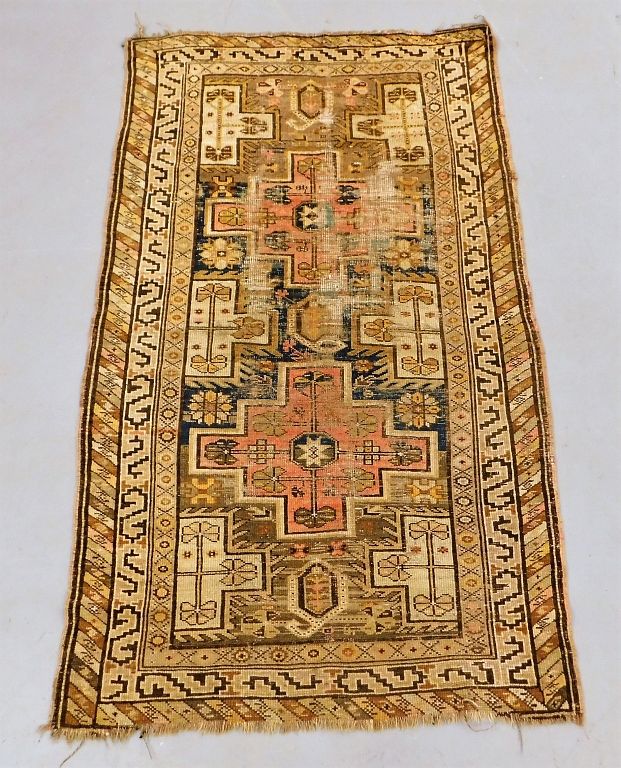 Appraisal: Caucasian Blue and Ivory Geometric Carpet Caucuses th Century Red