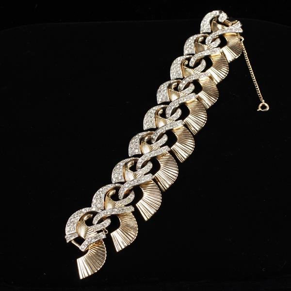 Appraisal: Boucher Retro Art Deco gold tone and pave rhinestone bracelet