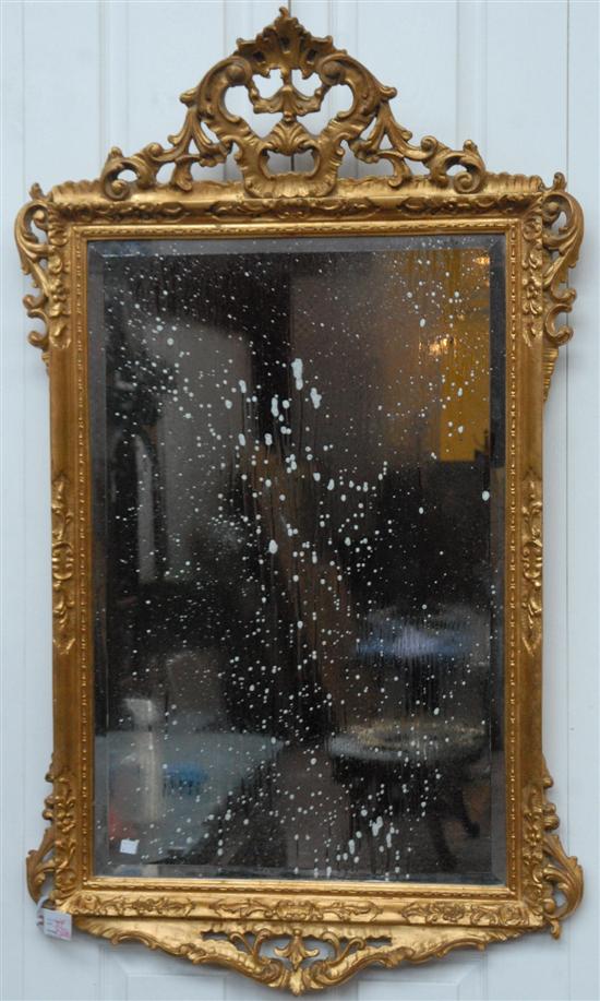 Appraisal: CARVED AND GILT MIRROR Having bevelled glass x