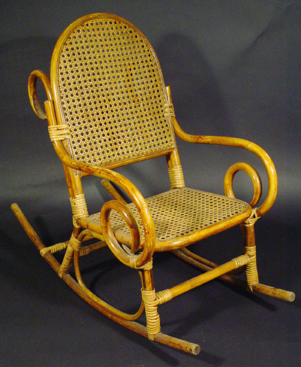 Appraisal: Bentwood child's rocking chair with cane back and seat cm