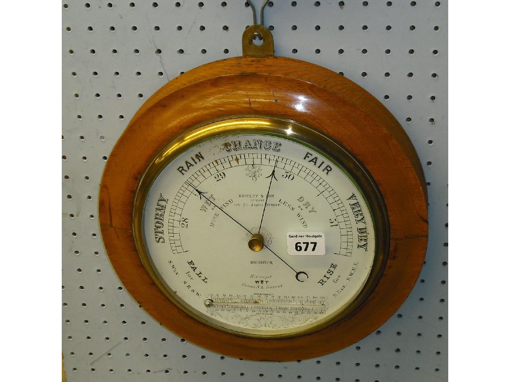 Appraisal: Circular wall barometer the circular white dial signed Rowley Son