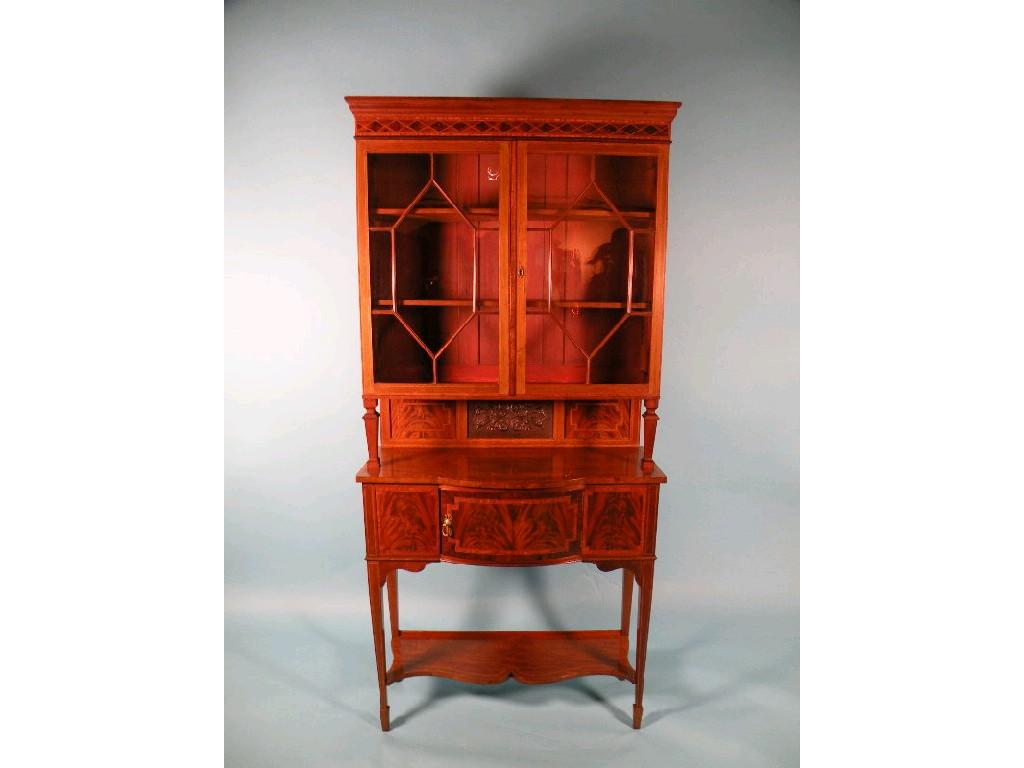 Appraisal: An Edwardian mahogany satinwood banded display cabinet the top with