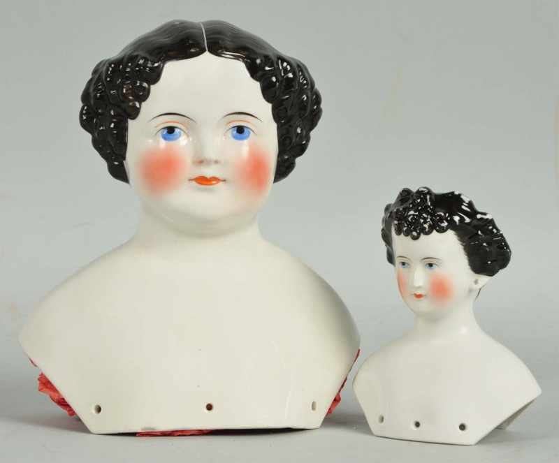 Appraisal: Lot of German China Doll Heads Description Smaller is Countess