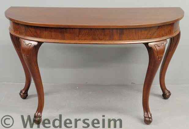 Appraisal: Chippendale style walnut D-shaped console table h x l x