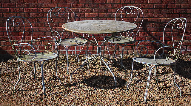 Appraisal: A CIRCULAR LIGHT BLUE PAINTED WROUGHT IRON GARDEN TABLE with