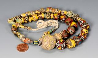 Appraisal: Near Eastern Mosaic Glass Bead Necklace Ancient Near Eastern strand