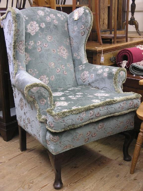 Appraisal: A good quality wing armchair recently upholstered in a floral