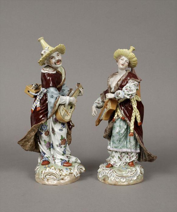 Appraisal: Pair of Dresden Gilt and Polychrome Decorated Porcelain Figures to