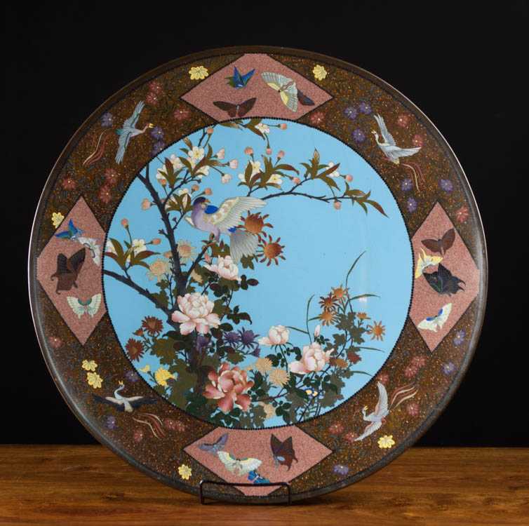 Appraisal: JAPANESE CLOISONNE CHARGER featuring center reserve with bird on blossoming