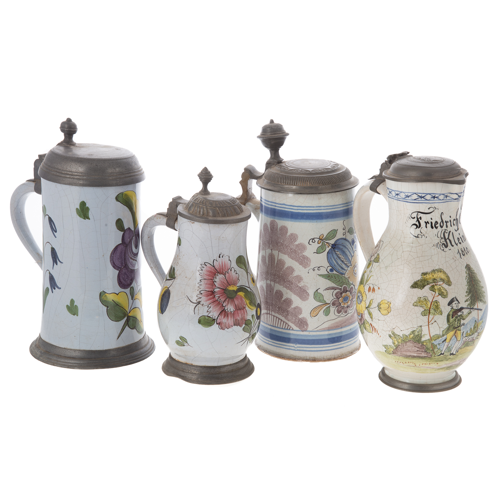 Appraisal: FOUR CONTINENTAL PEWTER MOUNTED FAIENCE STEINS Includes polychrome stein with