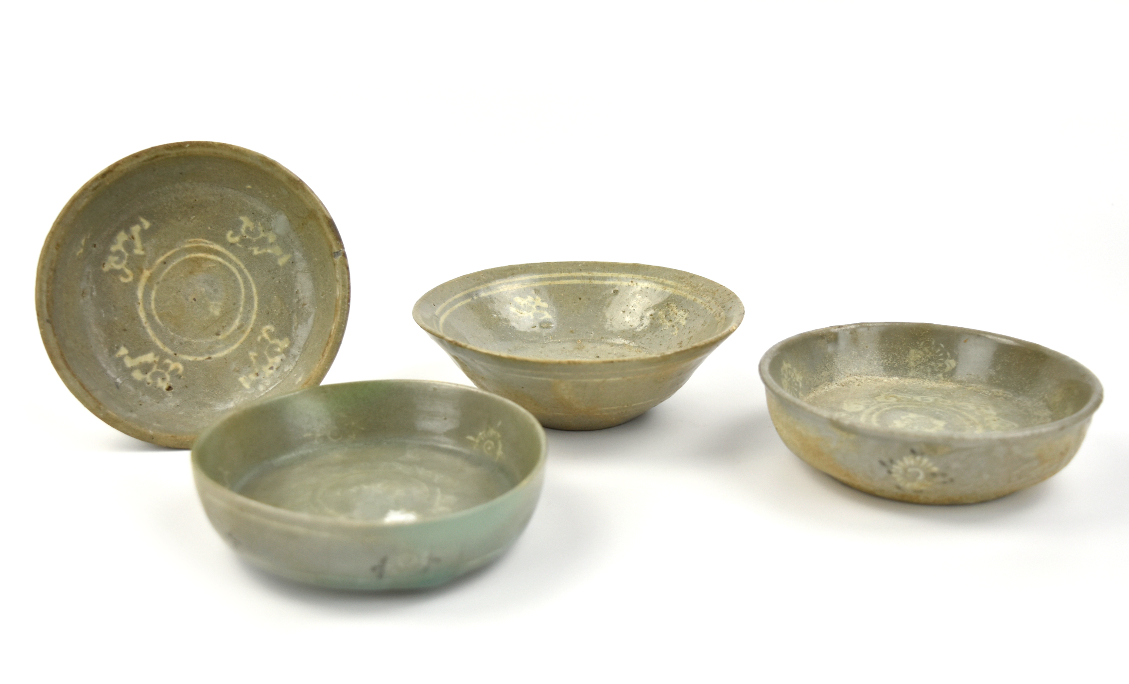 Appraisal: Chinese - th C shallow Korean celadon bowls washer molded