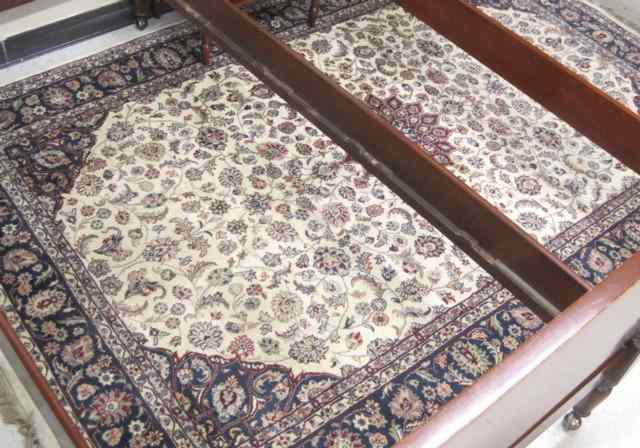 Appraisal: HAND KNOTTED ORIENTAL CARPET Indo-Persian floral and central floral rosette