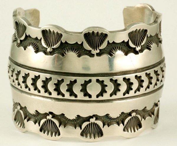 Appraisal: A massive sterling silver cuff probably of total cast design