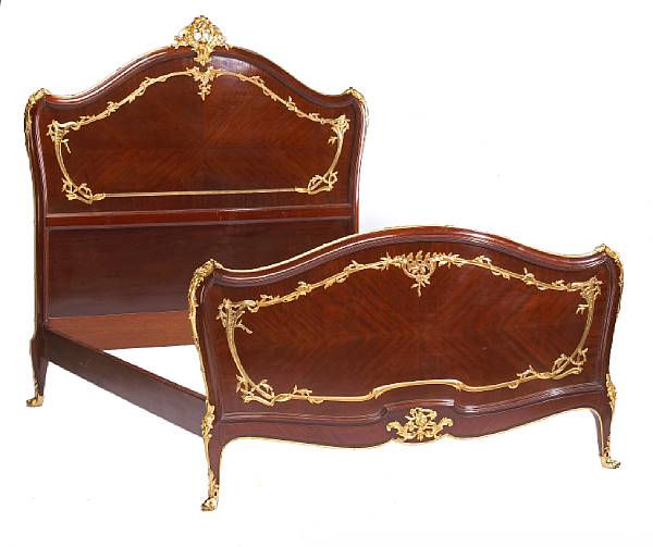 Appraisal: A Louis XV style gilt bronze mounted mahogany bedmounts indistinctly