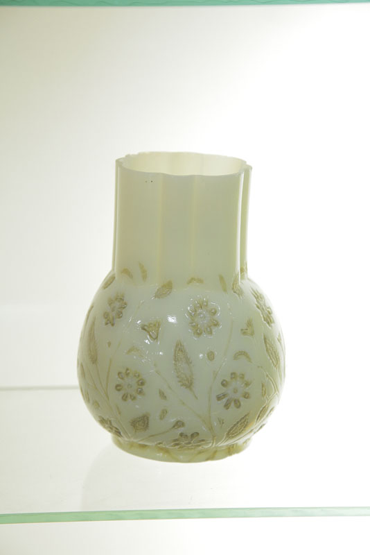 Appraisal: FINDLAY ONYX VASE Bulbous body with floral and foliate decoration