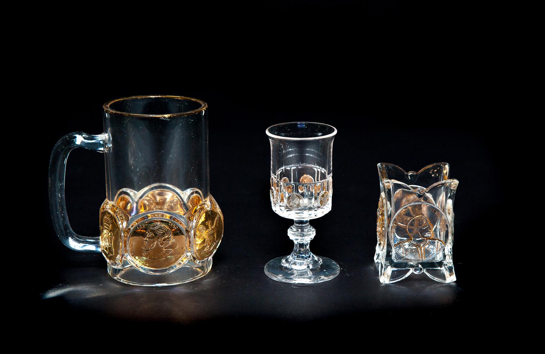 Appraisal: THREE PIECES OF COLUMBIA COIN GLASS Made on the grounds