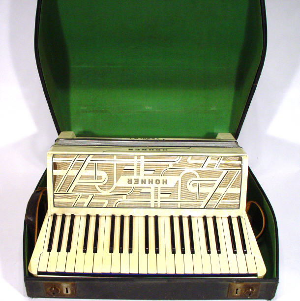 Appraisal: Hohner Art Deco style accordian in a white marbellised and