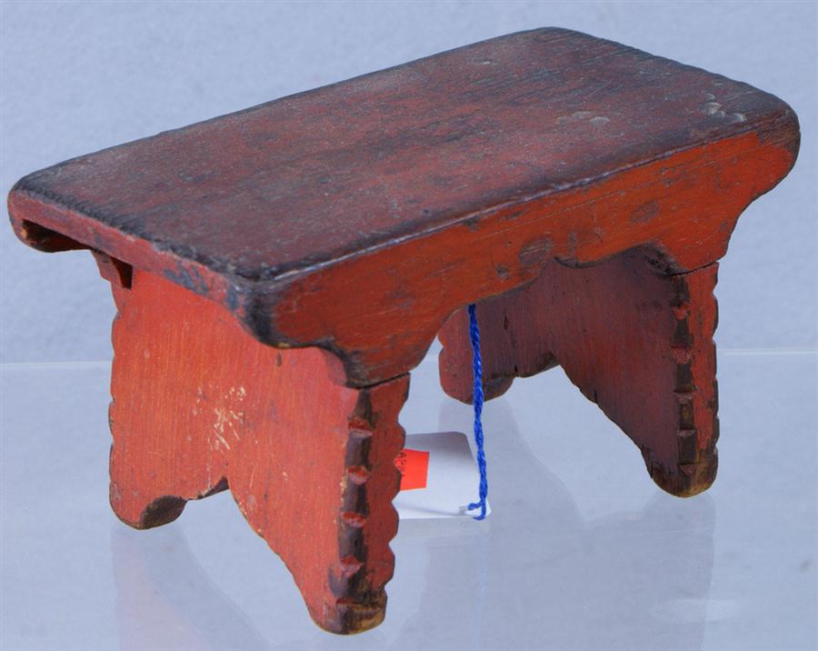 Appraisal: Miniature rectangular foot stool scalloped and chip carved details splayed