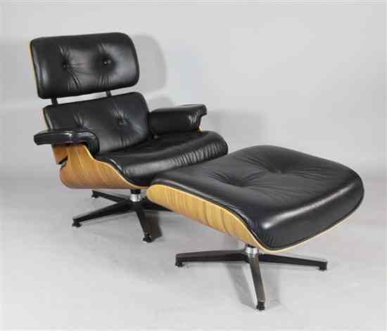 Appraisal: A Charles and Ray Eames design chair and ottoman possibly