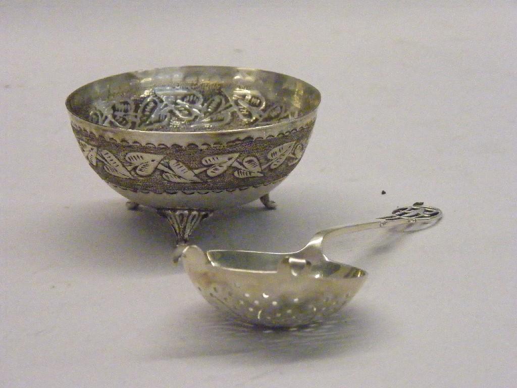 Appraisal: Small circular Eastern white metal bowl repousse with a continuous