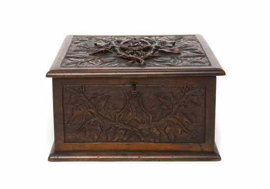 Appraisal: A Carved Walnut Jewelry Box of rectangular form the hinged