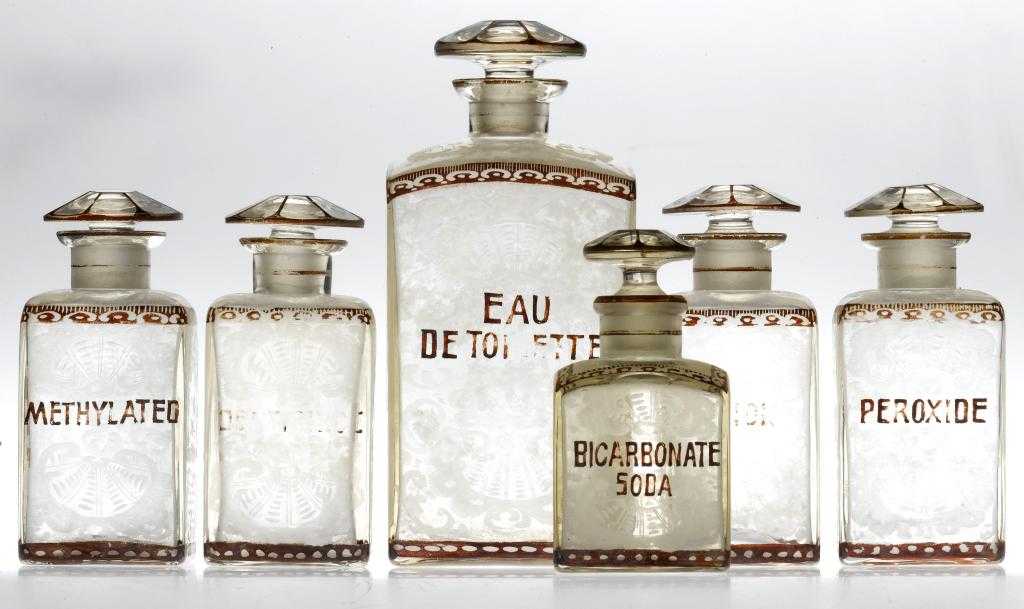 Appraisal: A SET OF SIX BOHEMIAN RUBY FLASHED GLASS SQUARE BOTTLES