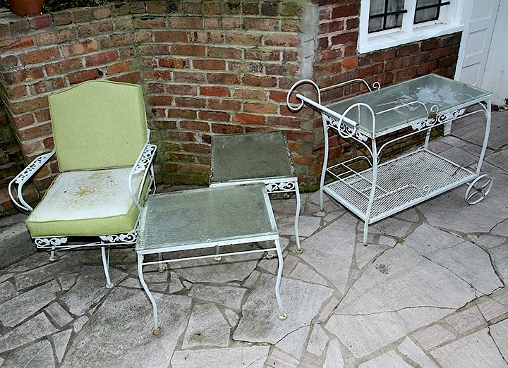 Appraisal: Iron Porch Lot A four piece set including a chair