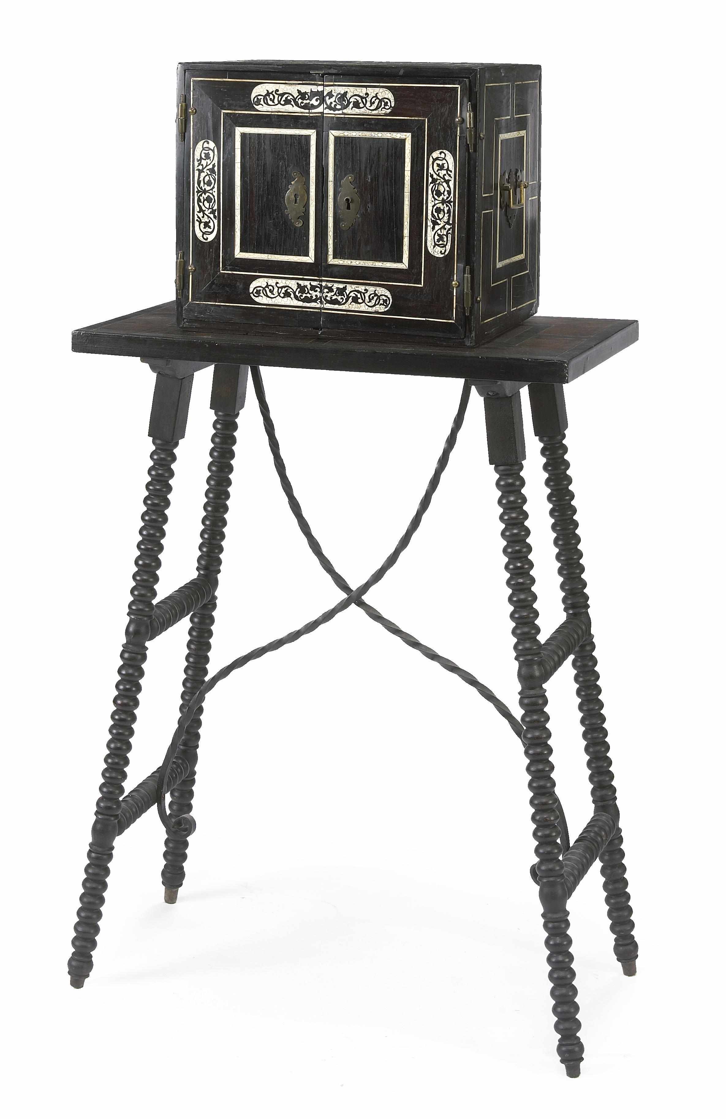 Appraisal: An Italian Baroque style ivory inlaid ebonized table cabinet on